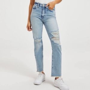 Good American High Rise Light Blue Distressed Jeans